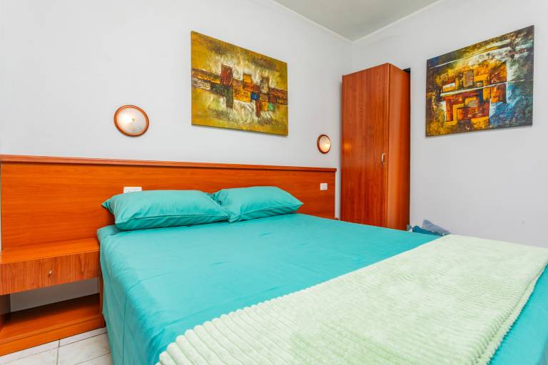 Child-friendly holiday apartment with barbecue, fast internet & yard | Garden view | Next to the beach | Dogs allowed — photo 5