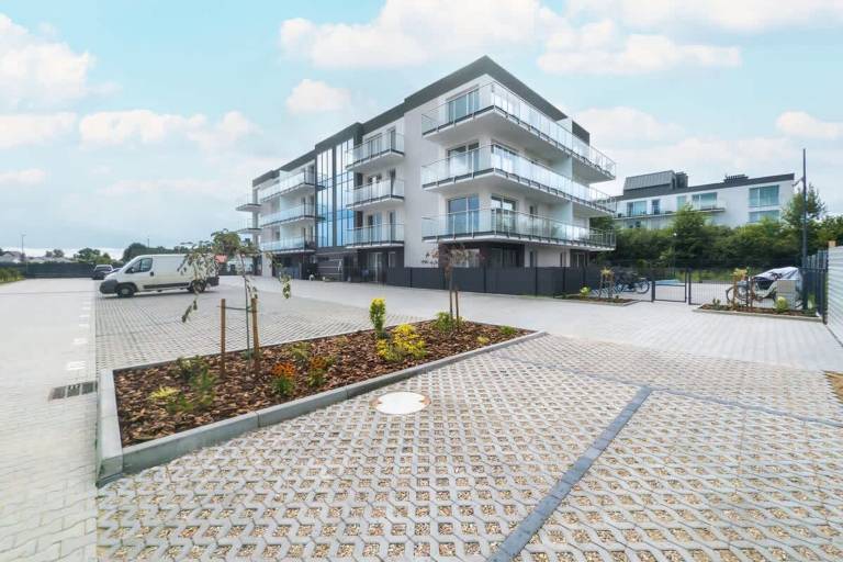 Child-friendly pleasant holiday apartment with yard & terrace | Close to the beach | Pet-friendly in Koszalin