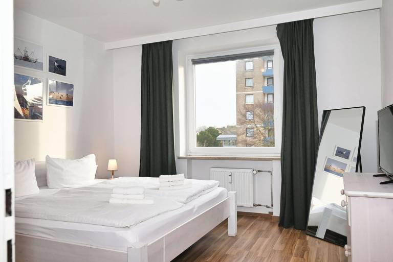 Küstenflair: Zentrale Ferienwohnung in Büsum – mit Balkon, Dachterrasse & Wohlfühlfaktor — photo 2