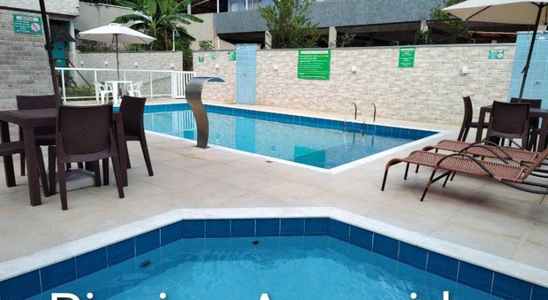Charming holiday apartment with yard, terrace & pool | Pets allowed in Caraguatatuba