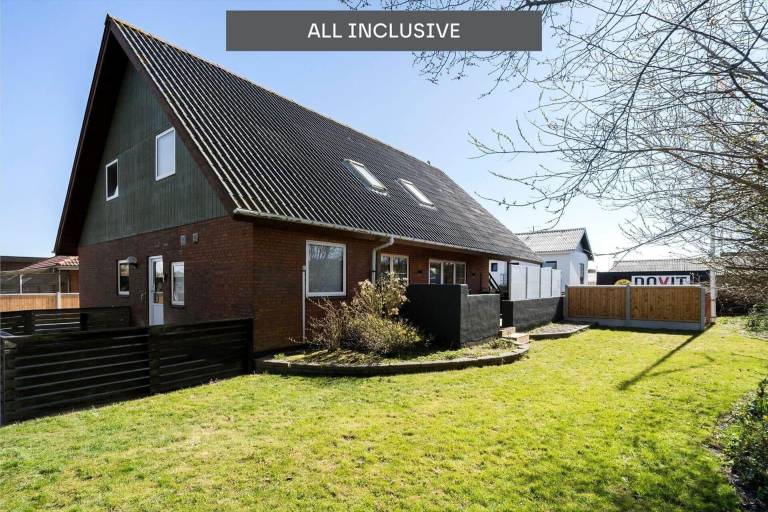 Apartment with patio, barbecue & yard in Ringkobing