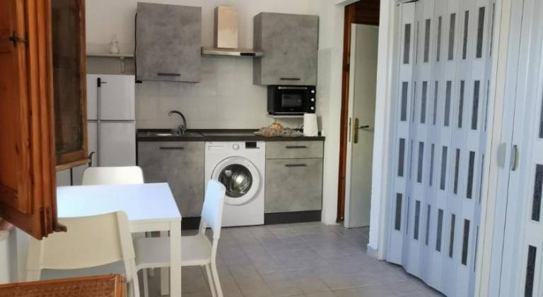 Pleasant holiday apartment with patio & garden | Next to the beach | Suitable for remote work | Pet-friendly in Budoni
