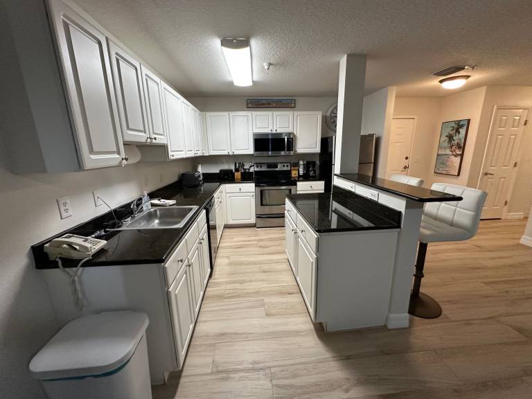 Condo with jacuzzi & heated pool | Water view — photo 5