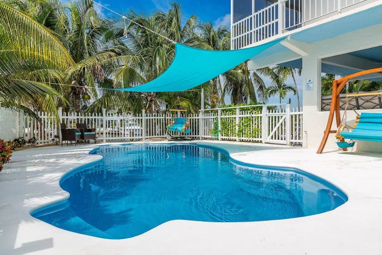 Gone Coastal Expansive Waterfront Pool Home — photo 2