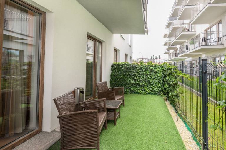Family-friendly charming holiday apartment with sauna, patio & yard | Pets allowed in Kolobrzeg