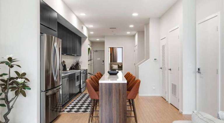 Penthouse River View Condo with Patio and Parking near Downtown — photo 4