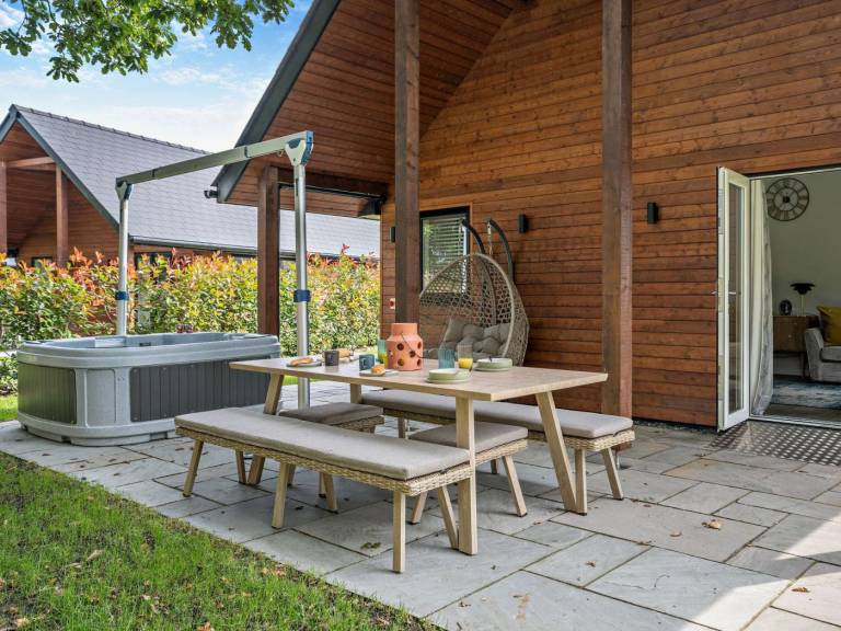 Lodge with yard, patio & hot tub | Pets are welcome — photo 2