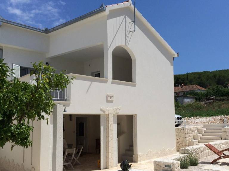 Vacation home with terrace, yard & BBQ in Trogir