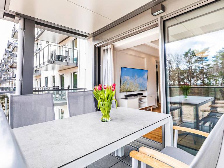 FeWo Strandlust: Moderne 80m² Wohnung mit Meerblick, Balkon, 2 Schlafzimmern — photo 2