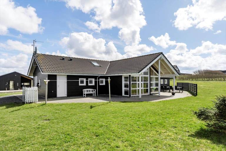 House with terrace, sauna & hot tub in Lokken