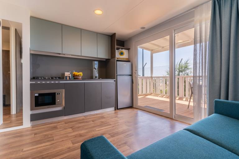Mobile home with patio & pool | Nature view — photo 4
