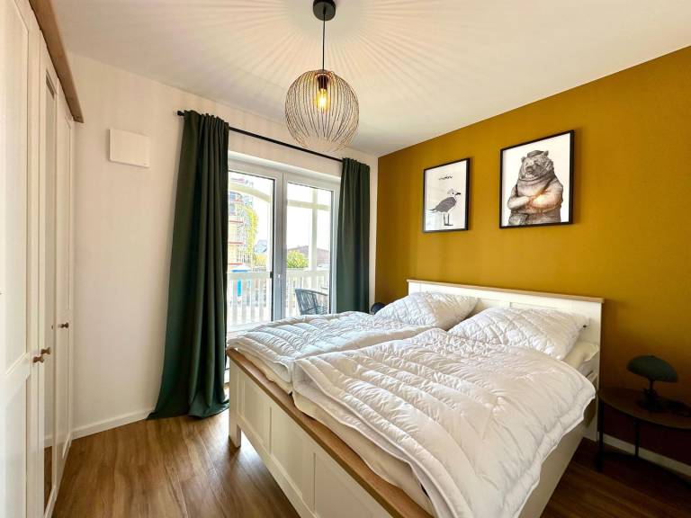 Moderne Ferienwohnung Sun mit überdachtem Balkon und Teilmeerblick in Haffkrug — photo 5