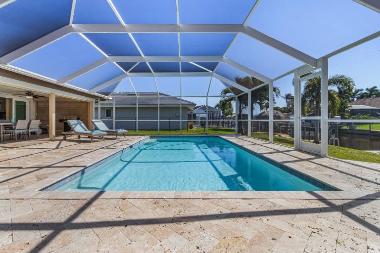Gulf Access, Kayak, Paddle Board, Heated Saltwater Pool and Dolphins! - Villa Delfin- Roelens in Cape Coral, FL