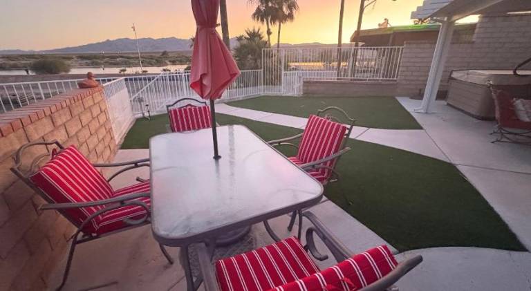 RIVERFRONT RUBY RED HOME WITH PRIVATE DOCK in Bullhead City, AZ