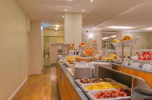 Juno Hotel & Apartments — photo 2