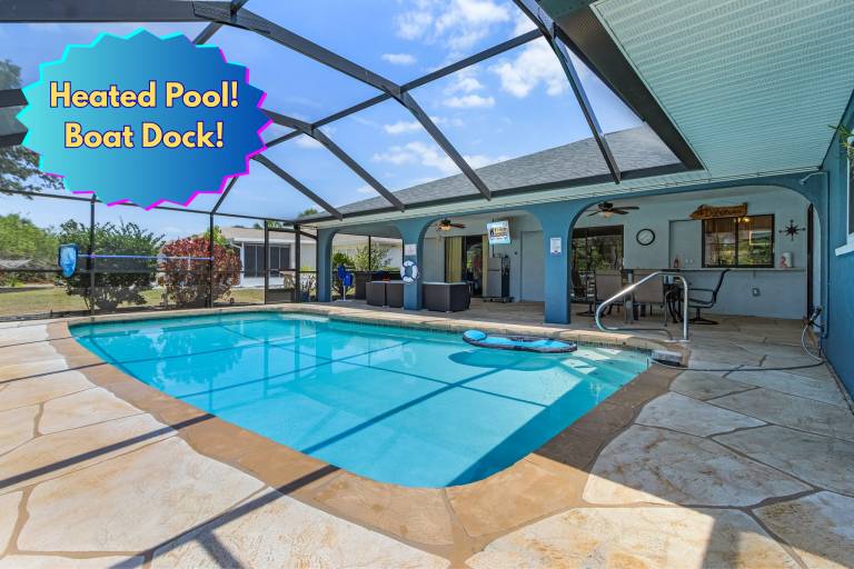 Vacation home with private pool & BBQ | Water view in Port Charlotte, FL