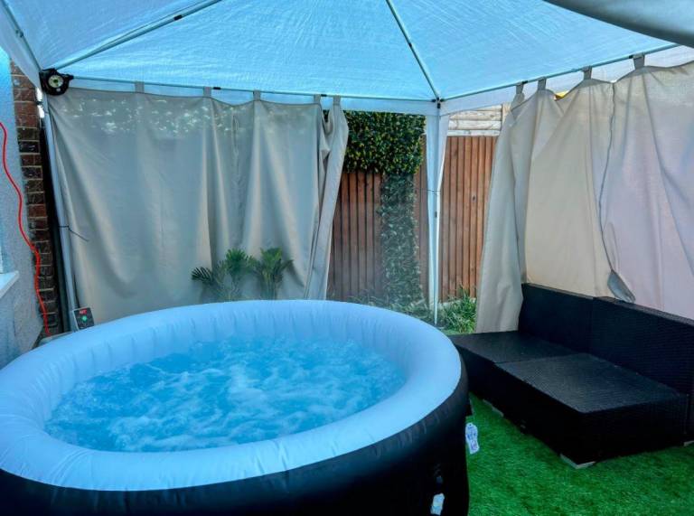 Nice vacation home with jacuzzi & yard | Pets allowed — photo 4