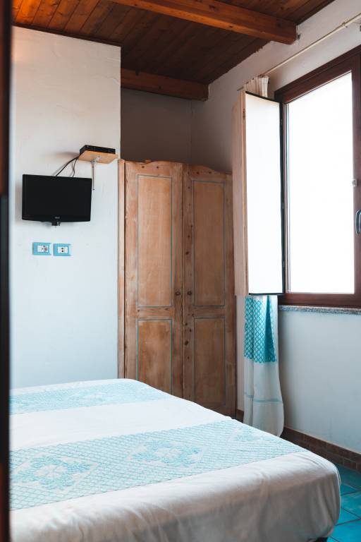 Irghitula: Camere con la possibilità di alloggiare fino 5 persone — photo 3