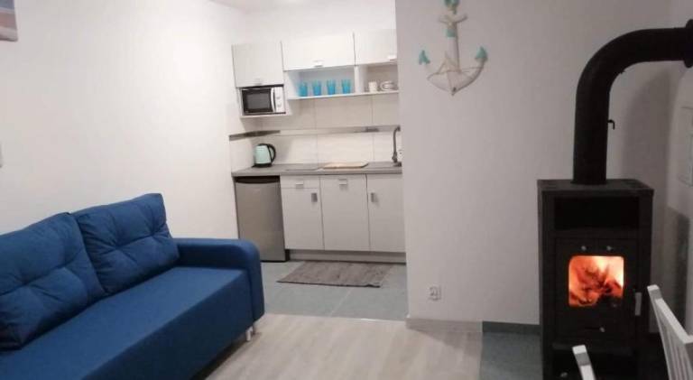 Holiday apartment with patio & yard in Ustka