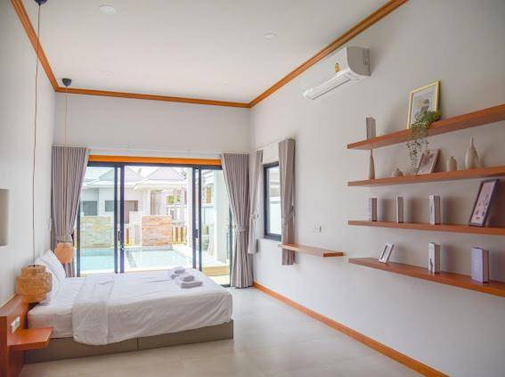 Villa with pool — photo 2