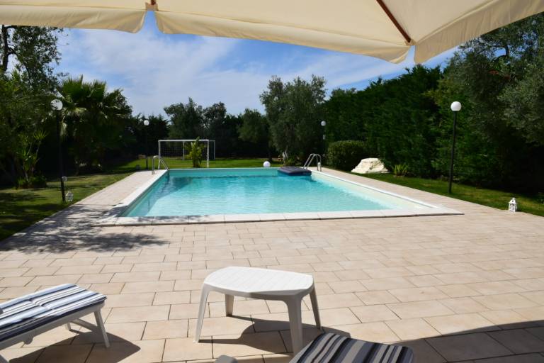 Villa with patio, barbeque & yard | Pool view — photo 4