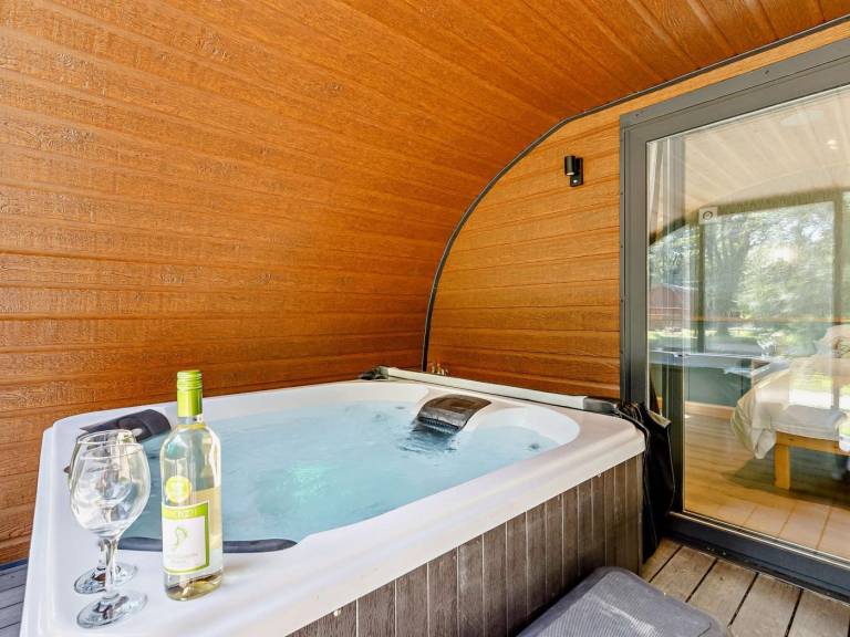Pleasant lodge with patio & hot tub | Water view | Pet-friendly — photo 3