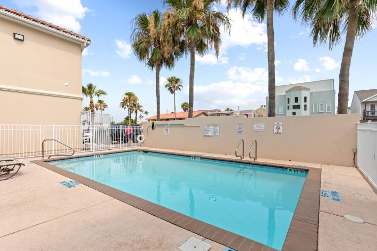 Condo with pool — photo 2