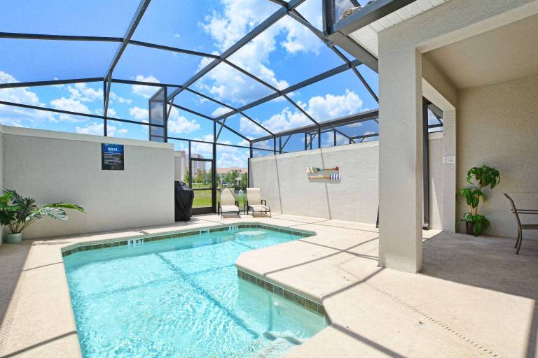 Child-friendly pleasant vacation home with patio, private pool & grill | Suitable for remote work | Pets allowed in Osceola, FL