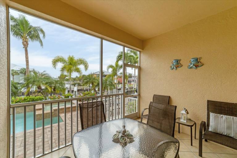 Condo with pool | Water view — photo 2