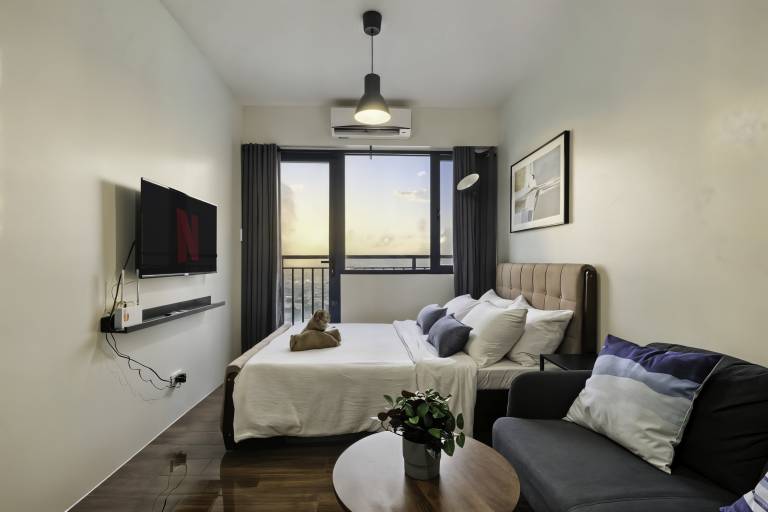 Elegantes Studio mit Stadtblick auf der Penthouse Etage