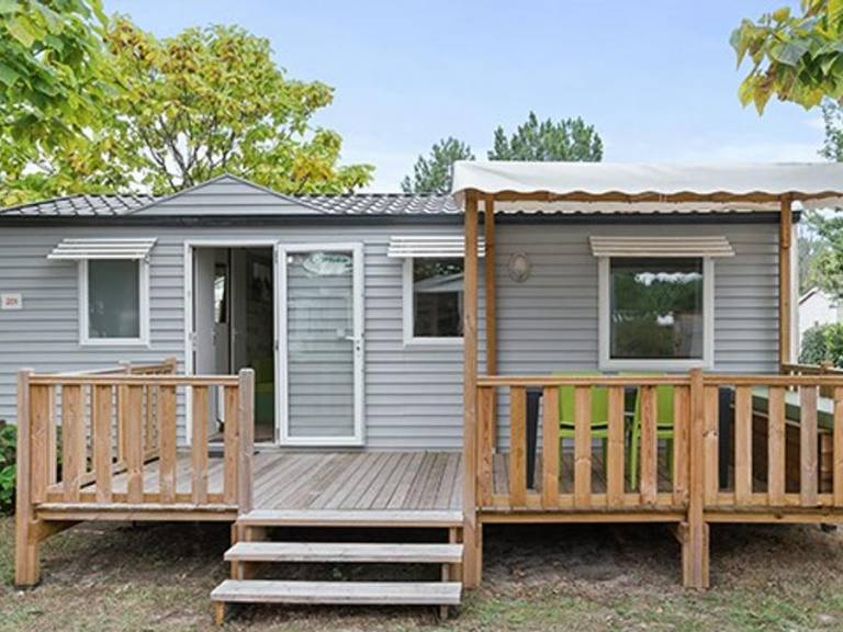 Child-friendly lovely mobile home with heated pool & patio | Beach nearby | Pets are welcome — photo 4
