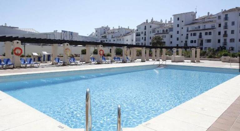Apartment with private pool, yard & terrace in Marbella