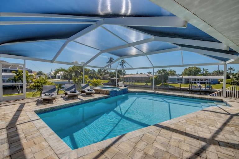 WATERFRONT - Walk to Beach, Pool/Spa, Kayaks, Bikes, Direct Gulf Access - Retro Retreat - Roelens in Cape Coral, FL