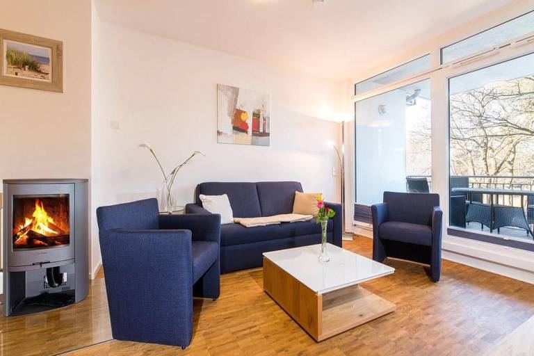 Modernes, strandnahes  Apartment mit großem Balkon, Fußbodenheizung u. Kaminofen — photo 2