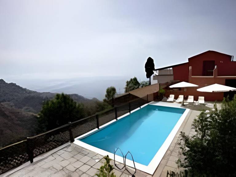 Vacation home with hot tub, terrace & yard in Letojanni