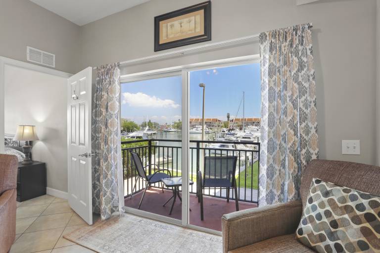 Condo with hot tub & heated pool | Water view in Treasure Island, FL