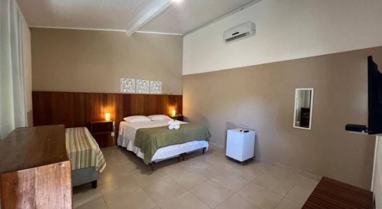 Suites Curio - Passarim Hospedagem — photo 2