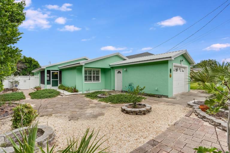 Short Walk to Beach! Private Heated Pool with Backyard Oasis! — photo 4