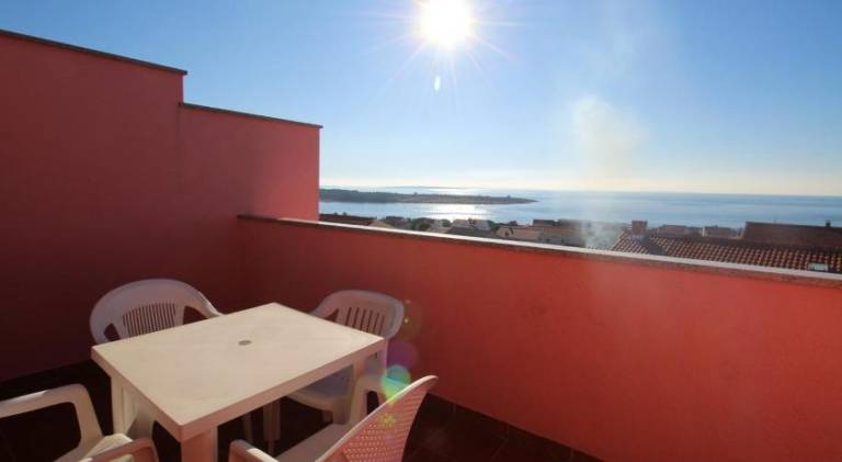 Holiday apartment with terrace & yard in Novalja