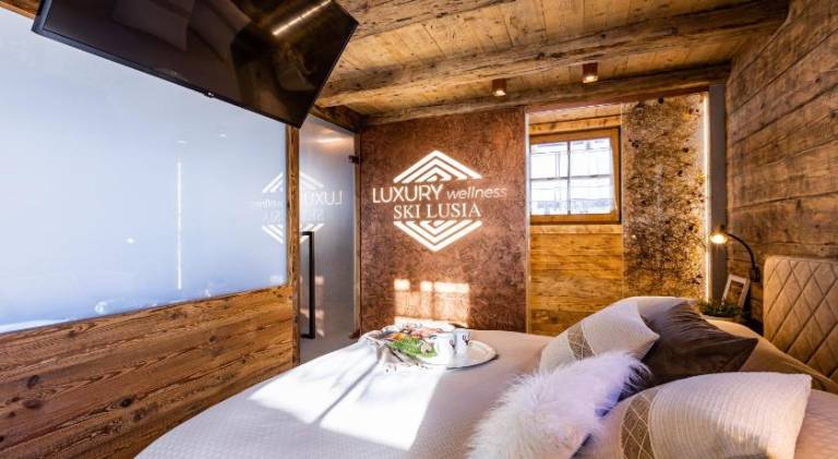 Chalet with hot tub in Predazzo