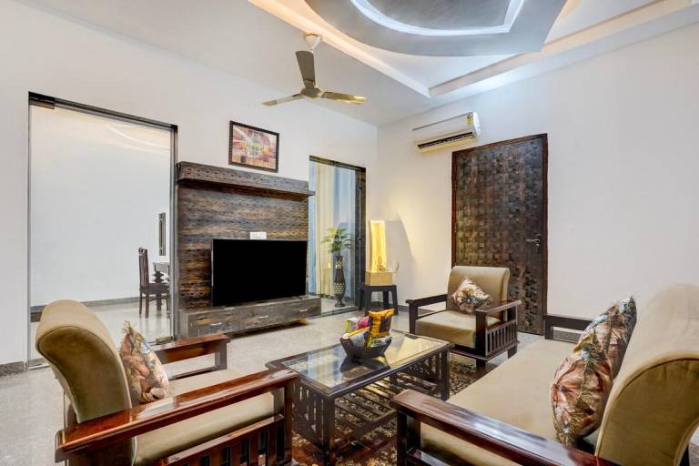 Charming vacation home with patio, pool & garden | Pets allowed in Faridabad