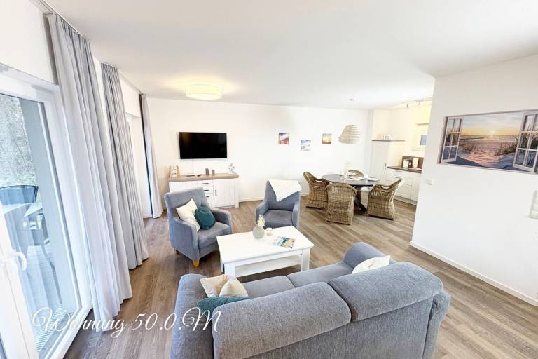 Moderne, hochwertige Ferienwohnung, Erdgeschoss, Sauna, Terrasse, strandnah — photo 2