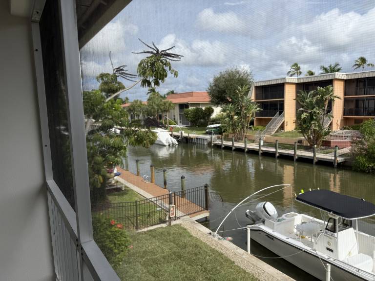 Naples Bay Clam Diggers_ Waterfront Condo with Private Boat Dock — photo 3