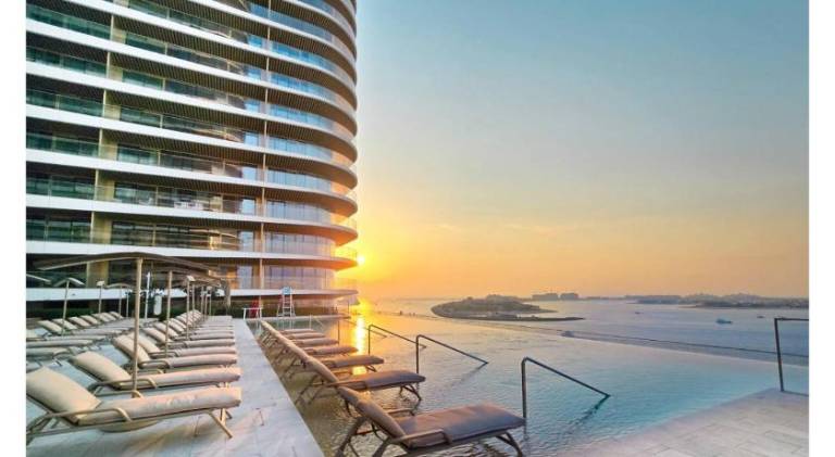 KeyRock - Stylish 2BR Apt with Palm Jumeirah View, Balcony, Pool & Gym Access — photo 3