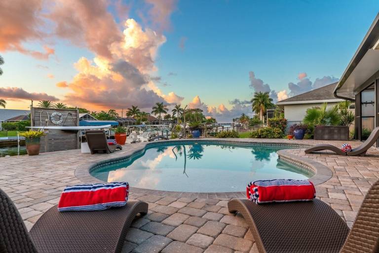 Family-friendly vacation home with private pool & barbecue | River view | Suitable for remote work | Pets allowed in Cape Coral, FL