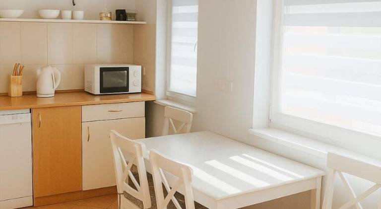 Holiday apartment with terrace, yard & grill — photo 3