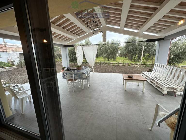 Villa with yard — photo 2