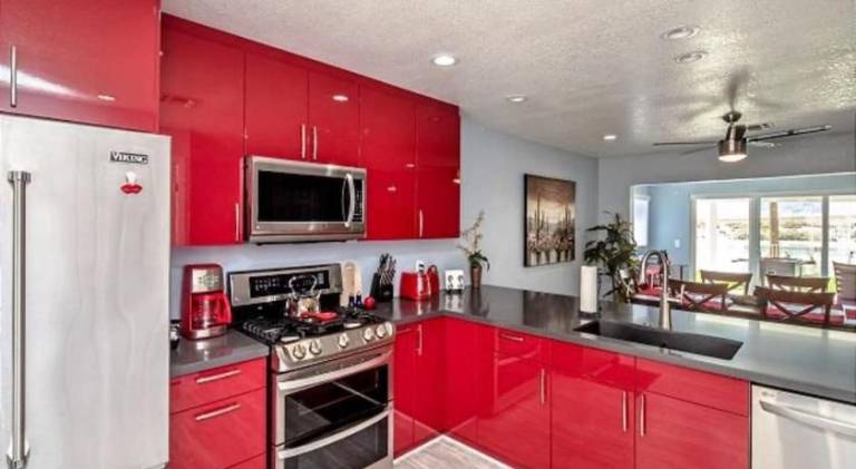 RIVERFRONT RUBY RED HOME WITH PRIVATE DOCK — photo 3