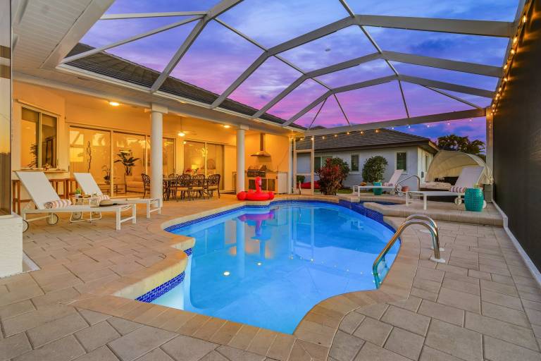 Experience Luxury- Gulf Access, Stunning Canal Views, Heated Pool- Villa Avalon - Roelens in Cape Coral, FL