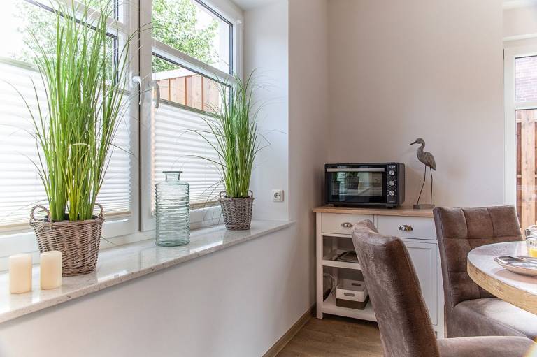 Modern, frisch und hochwertig: Dieses Reihenendhaus bietet Komfort für anspruchsvolle Gäste – zwei Boxspring-Schlafzimmer, gemütlicher Wohnbereich und Küstenbrise inklusive. — photo 2